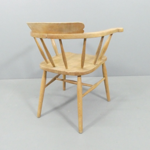 2015 - A mid-century light elm bow-arm Captain's chair.