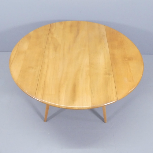 2016 - ERCOL - A mid-century Windsor bow-end drop leaf dining table. 113x73x61cm