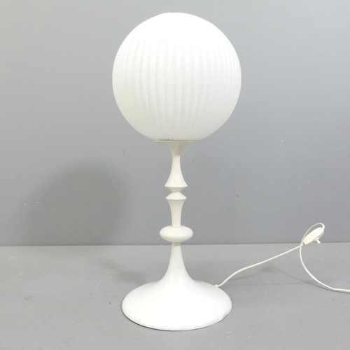 2022 - Temde, a 1960s Swiss table lamp, the fluted glass shade on whitewood and metal knopped stem and tuli... 