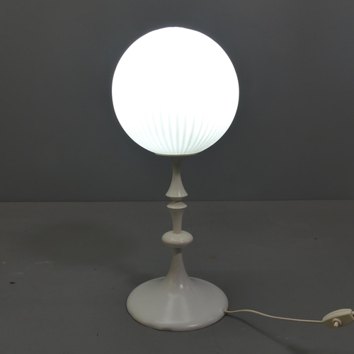 2022 - Temde, a 1960s Swiss table lamp, the fluted glass shade on whitewood and metal knopped stem and tuli... 