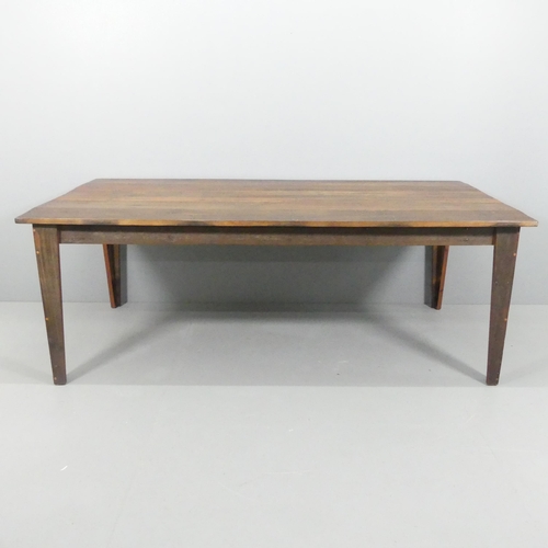 2025 - HASTINGS PIER INTEREST - A stained teak plank-top dining table, constructed from timber salvaged fro... 