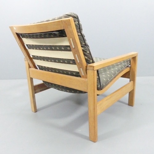 2026 - A mid-century teak and bent-ply framed and upholstered lounge chair, with label beneath for 