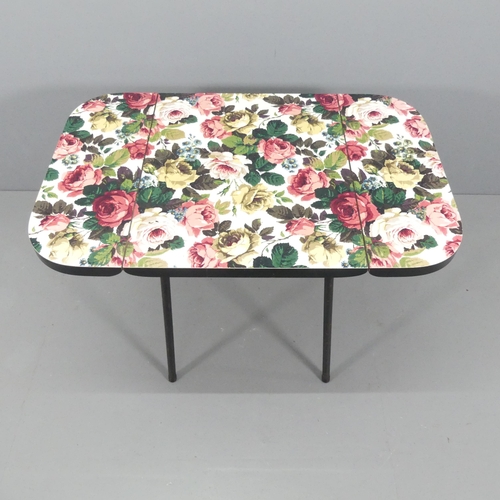 2027 - A mid-century style formica-topped drop-leaf table. 68x76x56cm (opening to 106cm).