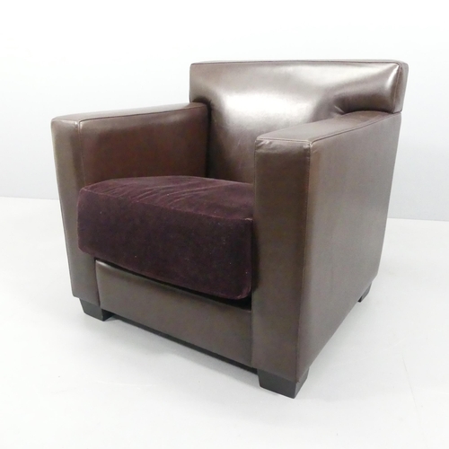 2028 - JEAN-MICHEL FRANK - A leather club chair, model 