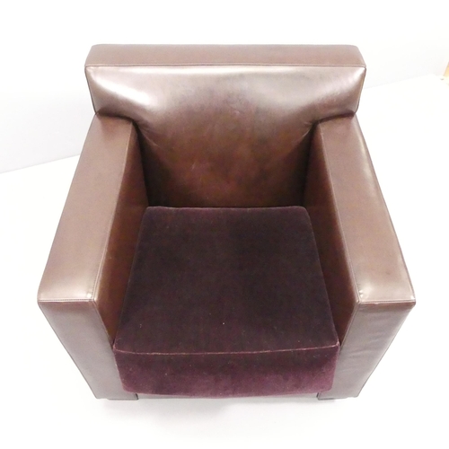 2028 - JEAN-MICHEL FRANK - A leather club chair, model 