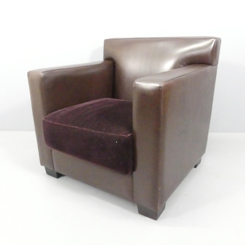 2029 - JEAN-MICHEL FRANK - A leather club chair, model 