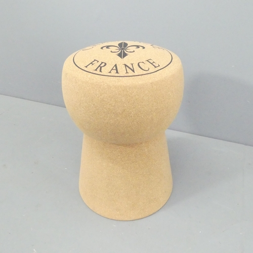 2032 - A contemporary champaign cork design stool. 34x51cm.