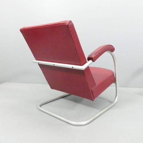 2045 - A mid-century modernist cantilever tubular steel lounge chair. WITH THE OPTION TO PURCHASE THE FOLLO... 