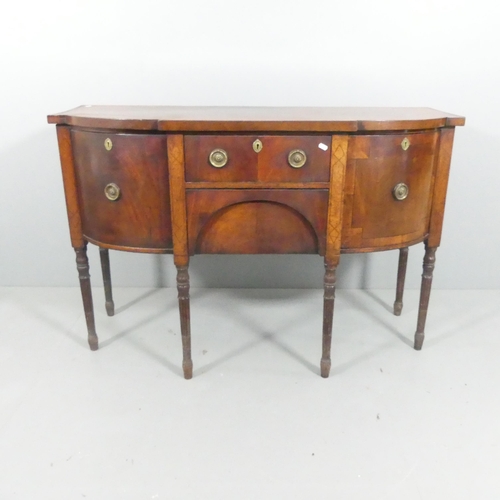 2112 - A 19th century mahogany bow front sideboard, with two drawers between two cupboard doors and raised ... 