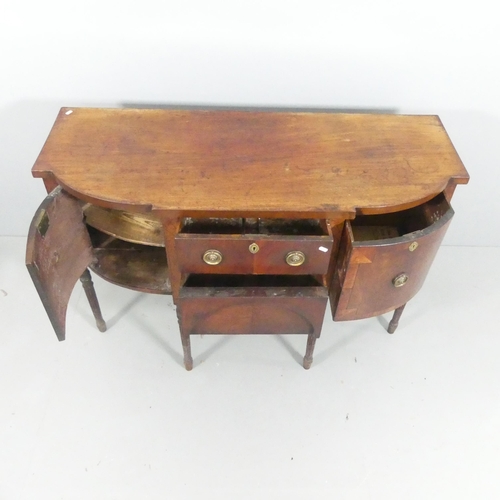 2112 - A 19th century mahogany bow front sideboard, with two drawers between two cupboard doors and raised ... 