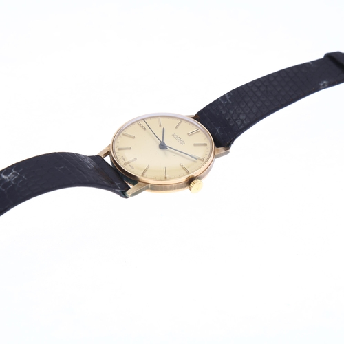 1011 - ROAMER - a 9ct gold mechanical wristwatch, circa 1982, champagne dial with applied gilt baton hour m... 