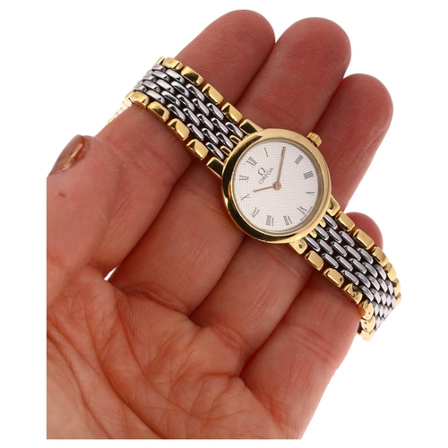 1029 - OMEGA - a lady's gold plated stainless steel De Ville quartz bracelet watch, ref. 795.0897, silvered... 