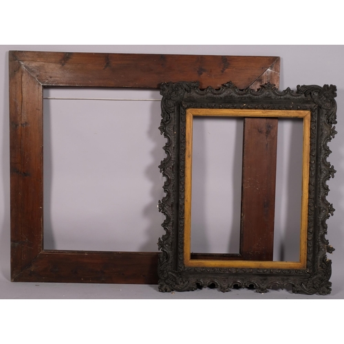 717 - A stained gesso picture frame, and a large pine frame (2)