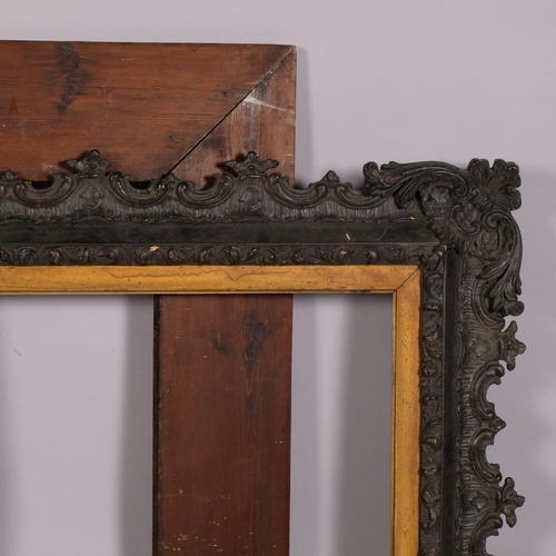 717 - A stained gesso picture frame, and a large pine frame (2)