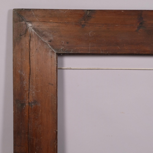 717 - A stained gesso picture frame, and a large pine frame (2)