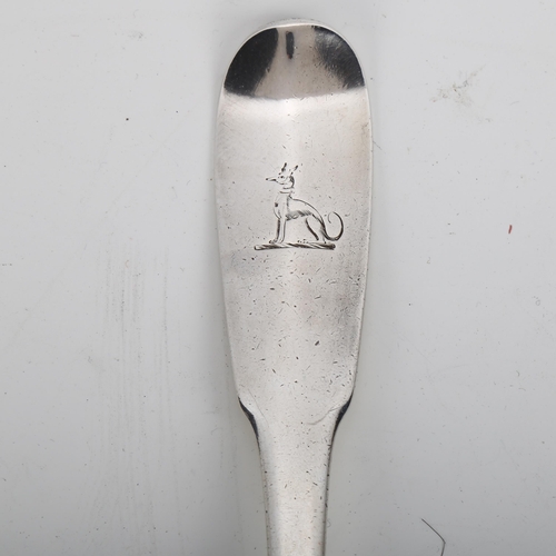 1662 - An 18th century silver stuffing spoon, indistinct hallmarks with engraved Greyhound crest and origin... 