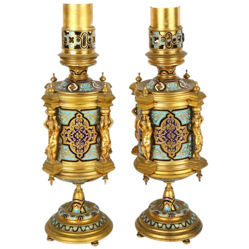 64 - Pair of 19th century gilt-brass and champleve enamel cylindrical table lamps, each lamp supported by... 