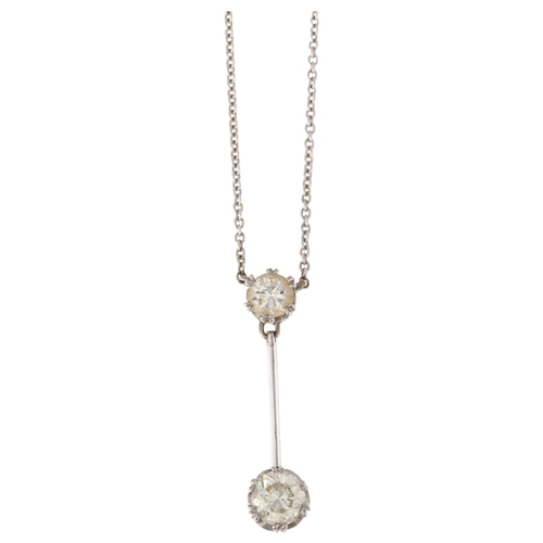 1107 - An 18ct white gold two stone diamond drop pendant necklace, claw set with modern round brilliant-cut... 