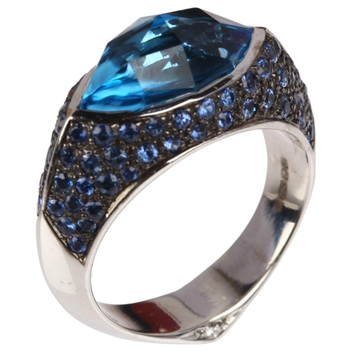 1110 - STEPHEN WEBSTER - a modern designer 18ct white gold blue topaz and sapphire Haze Collection ring, ma... 