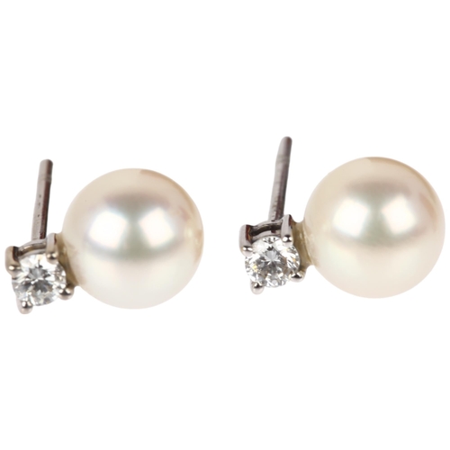 1116 - A pair of 18ct white gold whole pearl and diamond earrings, each claw set with 0.07ct modern round b... 