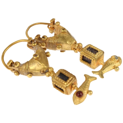 1120 - A pair of Ancient Roman style gold and garnet earrings, circa 20th century, the central loop with th... 