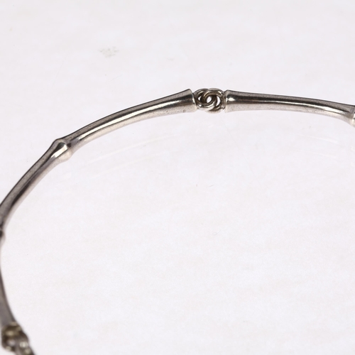 1126 - DINNY HALL - a modern 18ct white gold bamboo link bracelet, maker DHM, band width 3.3mm, 17.1g