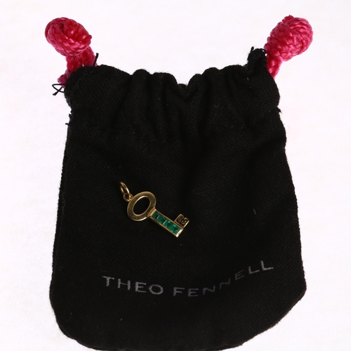 1130 - THEO FENNELL - a miniature 18ct emerald key pendant/charm, maker TF, London 2000, channel set with s... 