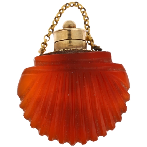 1131 - An 18th century French Regency gold-mounted miniature carnelian shell scent bottle, double-sided car... 