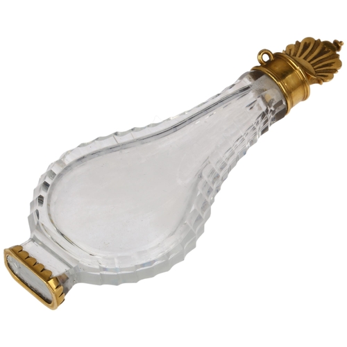 1132 - An 18th century French Louis XV gold-mounted crystal glass pear-shaped slimline scent bottle, circa ... 