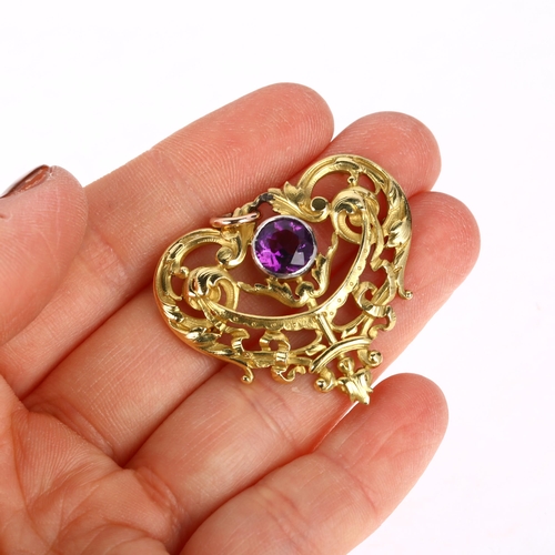 1135 - A French 18ct gold amethyst openwork pendant/brooch, circa 1900, pierced and relief foliate scrollwo... 