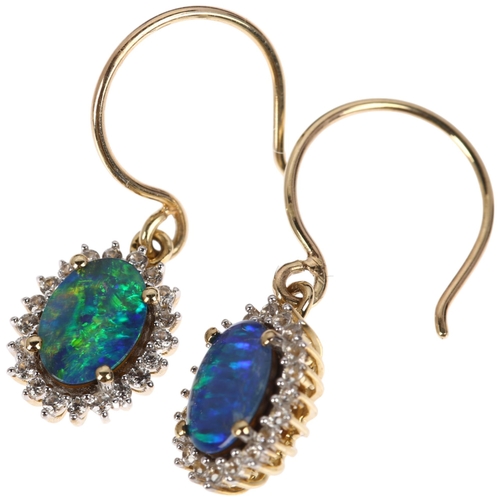 1143 - A pair of 9ct gold opal triplet and cubic zirconia oval cluster drop earrings, with shepherd hook fi... 