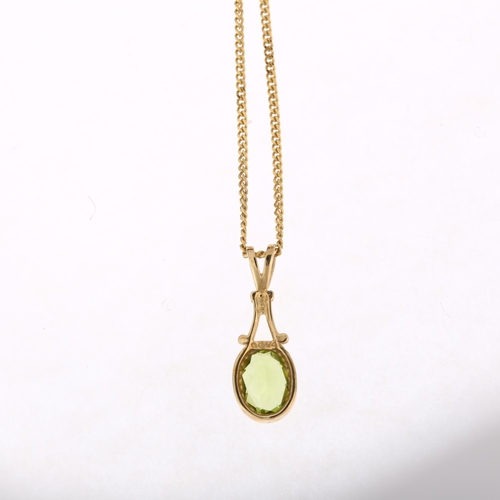 1149 - A modern 9ct gold peridot pendant necklace, rub-over set with oval mixed-cut peridot on 9ct fine cur... 