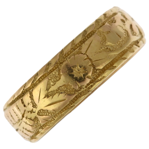 1160 - A 19th century 18ct gold wedding band ring, maker EDW, Birmingham 1888, chased and engraved floral a... 