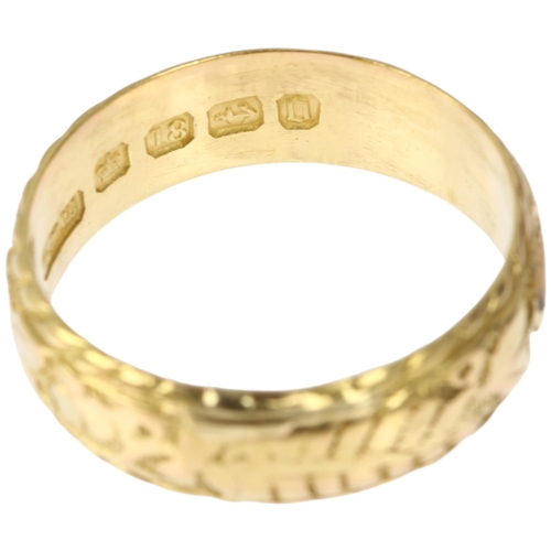 1160 - A 19th century 18ct gold wedding band ring, maker EDW, Birmingham 1888, chased and engraved floral a... 