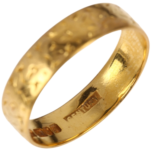 1161 - A mid-20th century 22ct gold wedding band ring, maker WW Ltd, London 1961, floral engraved decoratio... 