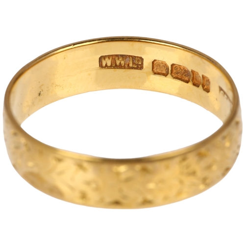 1161 - A mid-20th century 22ct gold wedding band ring, maker WW Ltd, London 1961, floral engraved decoratio... 