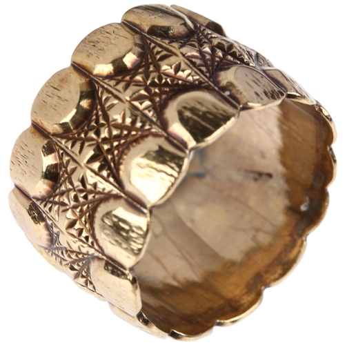 1165 - A late 20th century 9ct gold wedding band ring, maker MS&S, London 1980, engraved lobed and lattice ... 