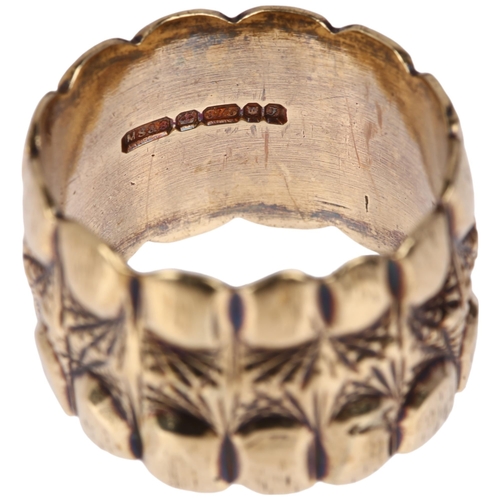 1165 - A late 20th century 9ct gold wedding band ring, maker MS&S, London 1980, engraved lobed and lattice ... 