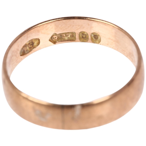 1167 - An early 20th century 9ct rose gold wedding band ring, maker NG, London 1917, band width 4.8mm, size... 