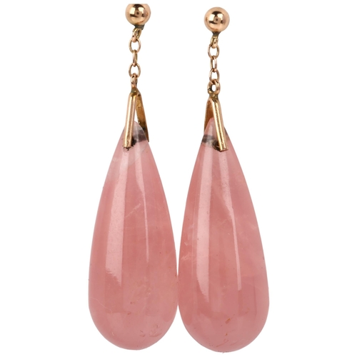 1173 - A pair of rose quartz drop earrings, each set with polished teardrop rose quartz with unmarked rose ... 