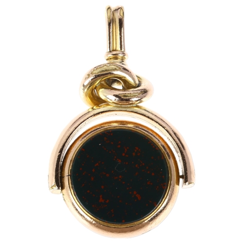 1176 - A Victorian rolled gold hardstone spinner swivel fob, set with sardonyx and bloodstone, hardstone di... 