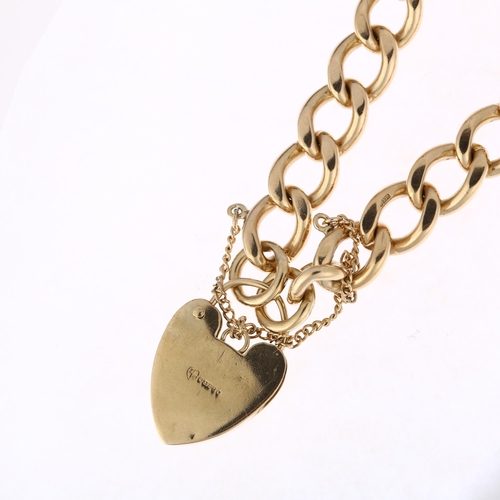 1179 - A mid-20th century 9ct gold solid curb link chain bracelet, maker FM, London 1966, with 9ct heart pa... 