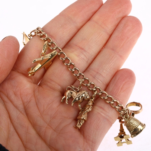 1181 - A 9ct rose gold curb link charm bracelet, with 12 various gold charms, including 18ct and 9ct, 16cm,... 