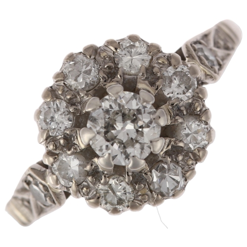 1185 - An 18ct white gold diamond flowerhead cluster ring, claw set with round-cut diamonds, total diamond ... 