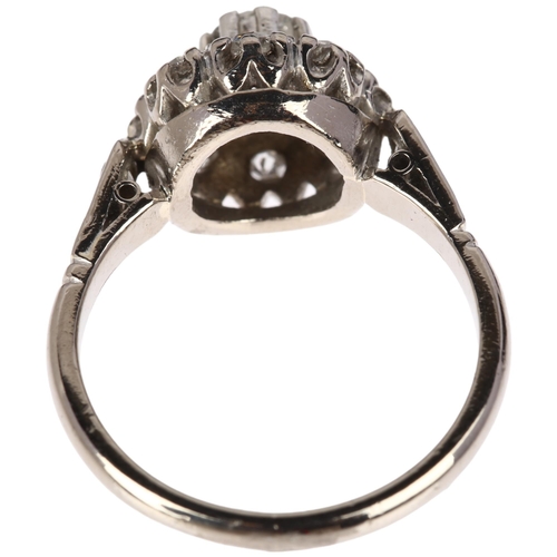 1185 - An 18ct white gold diamond flowerhead cluster ring, claw set with round-cut diamonds, total diamond ... 