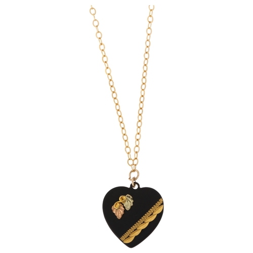 1194 - An American Black Hills 10k three-colour gold on black powder-coated metal heart pendant necklace, b... 