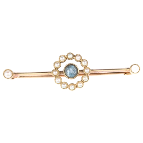 1210 - An Edwardian 15ct gold blue topaz and pearl target bar brooch, 38mm, 2.5g