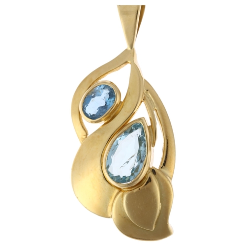 1211 - A modern 18ct gold blue topaz floral pendant, rub-over set with pear and oval-cut topaz, 42.6mm, 9.3... 