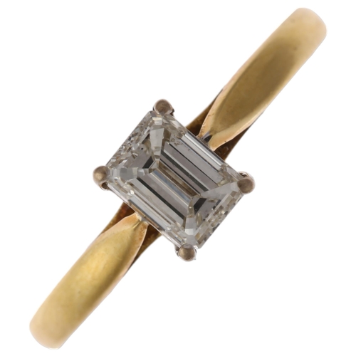 1213 - An 18ct gold 0.7ct solitaire diamond ring, maker RB, London 1999, claw set with emerald-cut diamond,... 