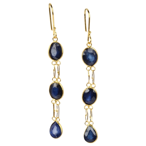 1217 - A pair of 14ct gold sapphire drop earrings, rub-over set with oval mixed-cut sapphires and shepherd ... 